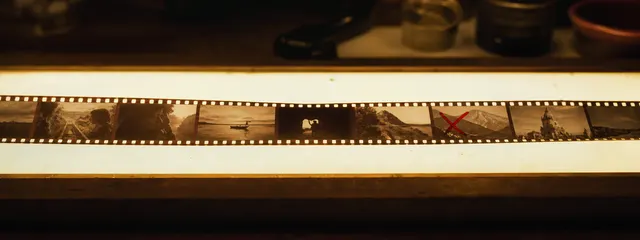 35mm contact sheet on a darkroom light table