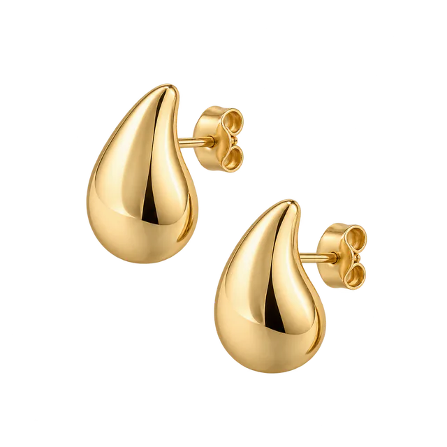 Sculptural gold earrings shown on white and transparent backgrounds